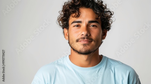 Latin american latino man wearing plain pure light blue blank oversized crew neck loose t-shirt isolated on white background photo