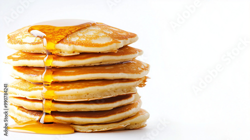 Wallpaper Mural  A tall stack of pancakes drizzled with syrup on a white background Torontodigital.ca