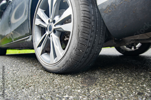 Tires for rainy and wet conditions of suv car. Driving safety in rainy weather concept.