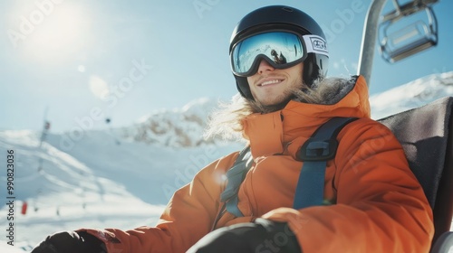 Young Snowboarder on Chairlift in Sunny Mountain Landscape.