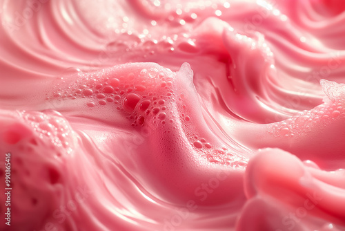 The visual presents a delicate swirl of pink foam, showcasing smooth, flowing textures with tiny bubbles. This vibrant backdrop adds charm to any creative endeavor