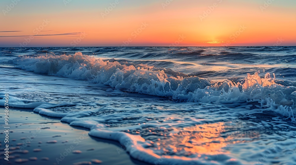 A serene image of a calm ocean at sunset with waves gently lapping at the shore and the sky painted in warm hues of orange and pink A serene image of a calm ocean at sunset with waves gently lapping at the shore and the sky painted in warm hues of orange and pink