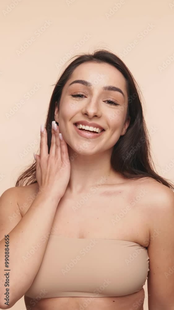 Close-up of a flawless complexion, woman touching her shoulder, symbolizing skin health and beauty routine. Close-up of a flawless complexion, woman touching her shoulder, symbolizing skin health and beauty routine.