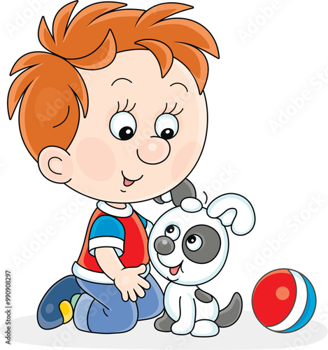 Happy little boy playing wi...