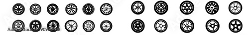 Car wheels isolated on black background. Various silhouettes of automobile tires.