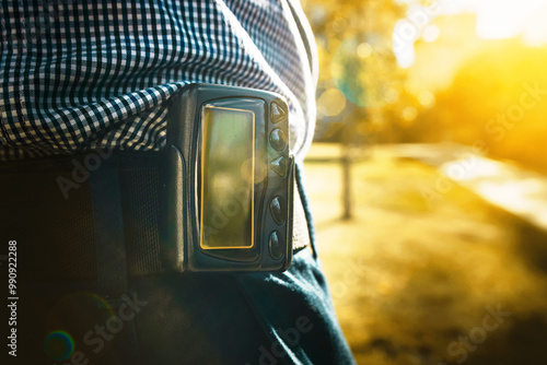 Konstfotografi Man wearing pager on his belt