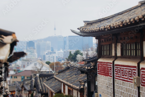 Bukchon Hanok Village, Jongno District, Seoul, South Korea, streets with traditional korean houses, travel to South Korea concept in a spring sunny day photo