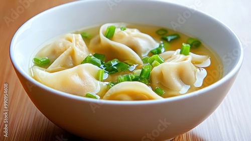 Delicious Dumplings in Savory Broth with Green Onions