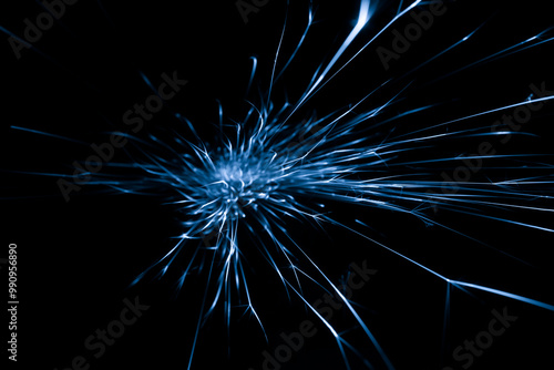 blue sparks from the grinder glowing in the dark