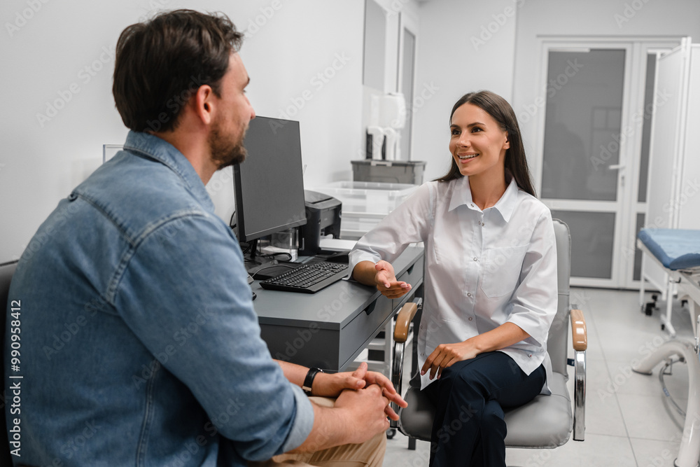 Smiling young Caucasian woman doctor consulting male patient man at meeting in modern hospital. Smiling female physician practitioner talking, giving recommendation, discussing checkup or symptoms Smiling young Caucasian woman doctor consulting male patient man at meeting in modern hospital. Smiling female physician practitioner talking, giving recommendation, discussing checkup or symptoms