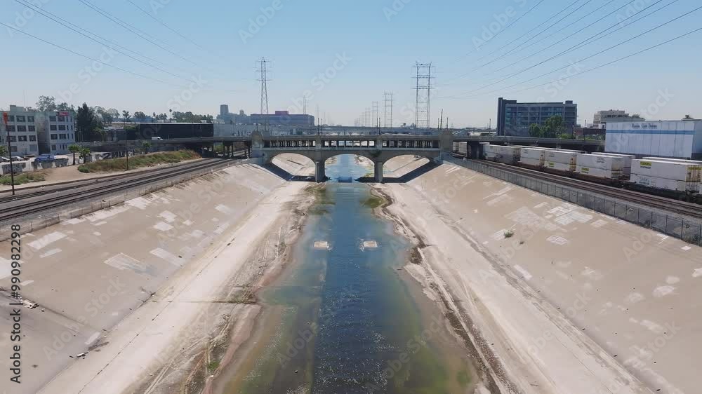 Beautiful sunny day over LA river. Concrete river with bridges over it. Cinematic place near Los Angeles downtown. Beautiful sunny day over LA river. Concrete river with bridges over it. Cinematic place near Los Angeles downtown.