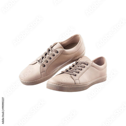 A pair of light pink leather sneakers with white soles.