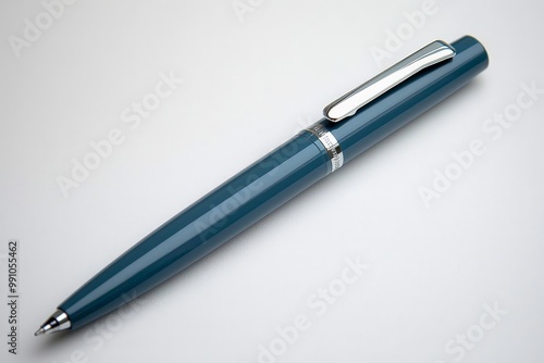 Elegant Blue Pen with Silver Clip on Minimalist White Surface - Professional Luxury Stationery Concept