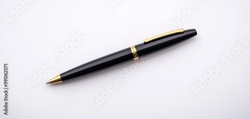 Sleek Black and Gold Pen on Clean White Surface - Elegant Stationery Concept