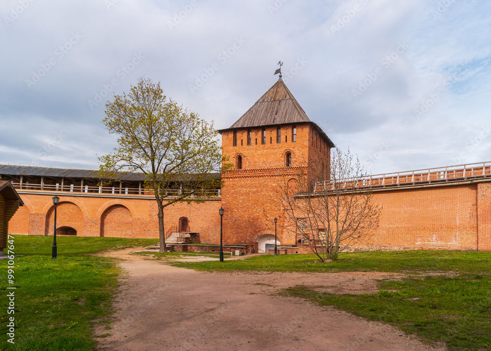 Veliky Novgorod, Russia. View of the Vladimir Tower of the Novgorod Kremlin. The territory of the Detinets. Veliky Novgorod, Russia. View of the Vladimir Tower of the Novgorod Kremlin. The territory of the Detinets.