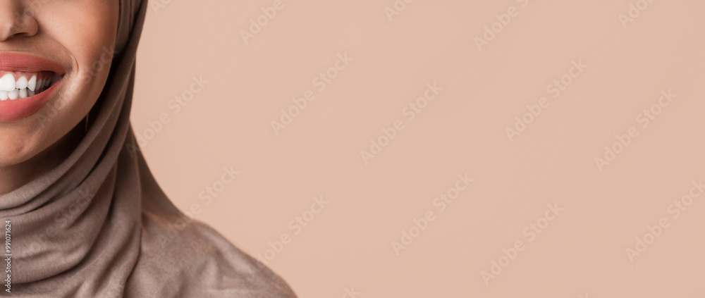 Fototapeta premium Stomatology Concept. Closeup of perfect white smile of black muslim woman in headscarf, happy after teeth alignment or whitening treatment, panorama
