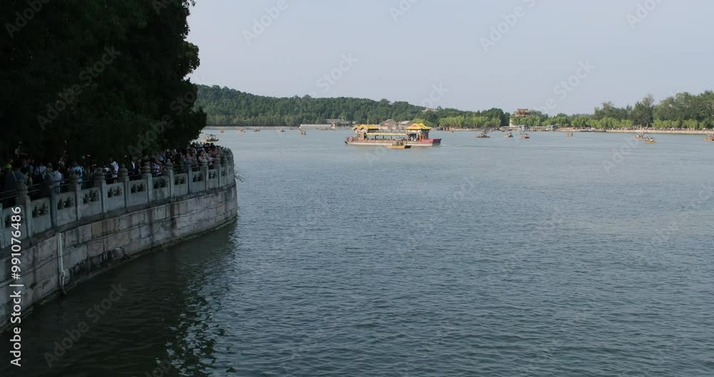 Kunming Lake and tourists in Summer Palace in Beijing, China Kunming Lake and tourists in Summer Palace in Beijing, China