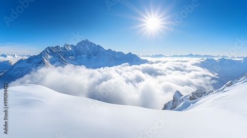 Majestic snow-capped mountains rise through a sea of clouds with bright sunburst and azure sky, presenting a dramatic alpine winter scene with pristine snow and ethereal atmosphere.