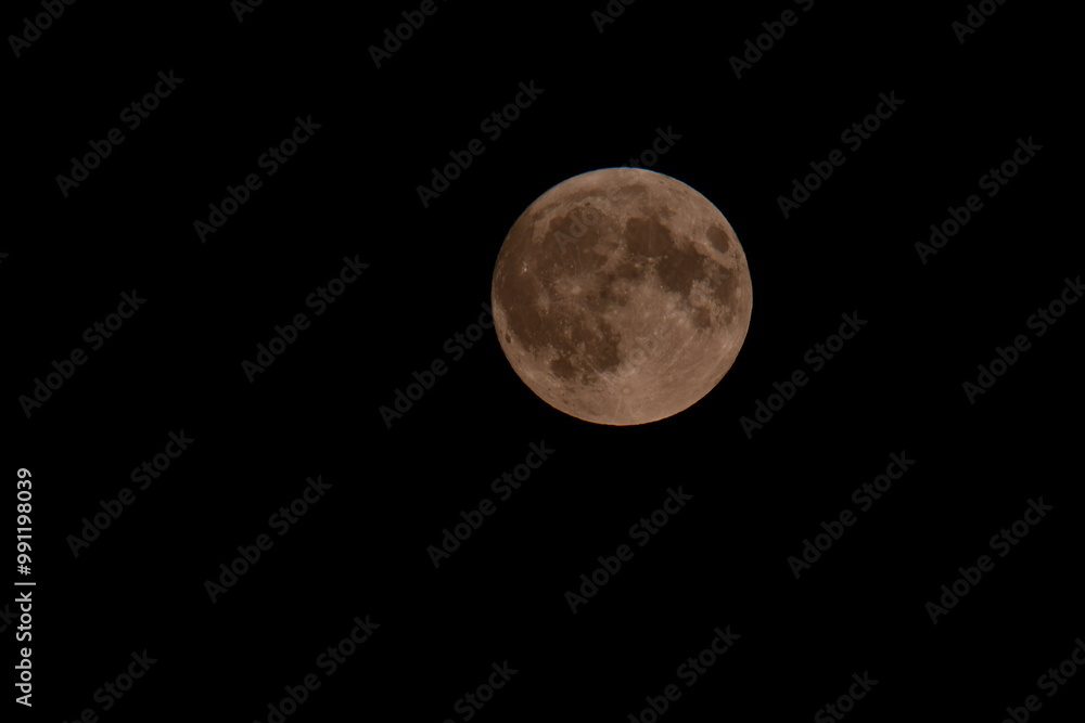 Full Harvest moon in the night sky, Kilkenny, Ireland. Full Harvest moon in the night sky, Kilkenny, Ireland.