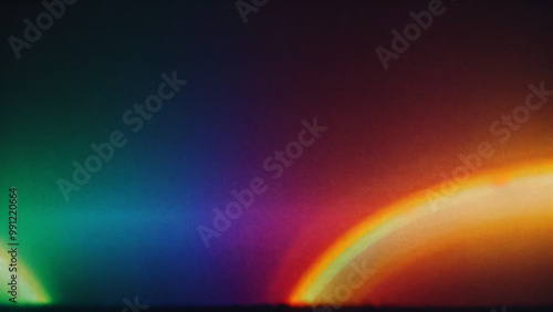 Blur colorful warm rainbow light leaks on black background with dust texture. Defocused abstract damaged scratched retro film analog effect for using over photos as overlay or screen filter