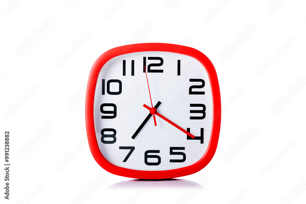 Red wall-mounted analog clock with clear, bold hands, isolated against a plain white background. The image emphasizes simplicity and time management concepts Red wall-mounted analog clock with clear, bold hands, isolated against a plain white background. The image emphasizes simplicity and time management concepts