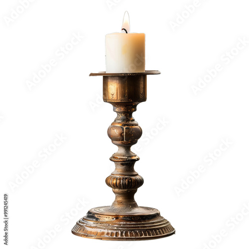 Antique golden candlestick holding a burning white candle, casting a warm glow