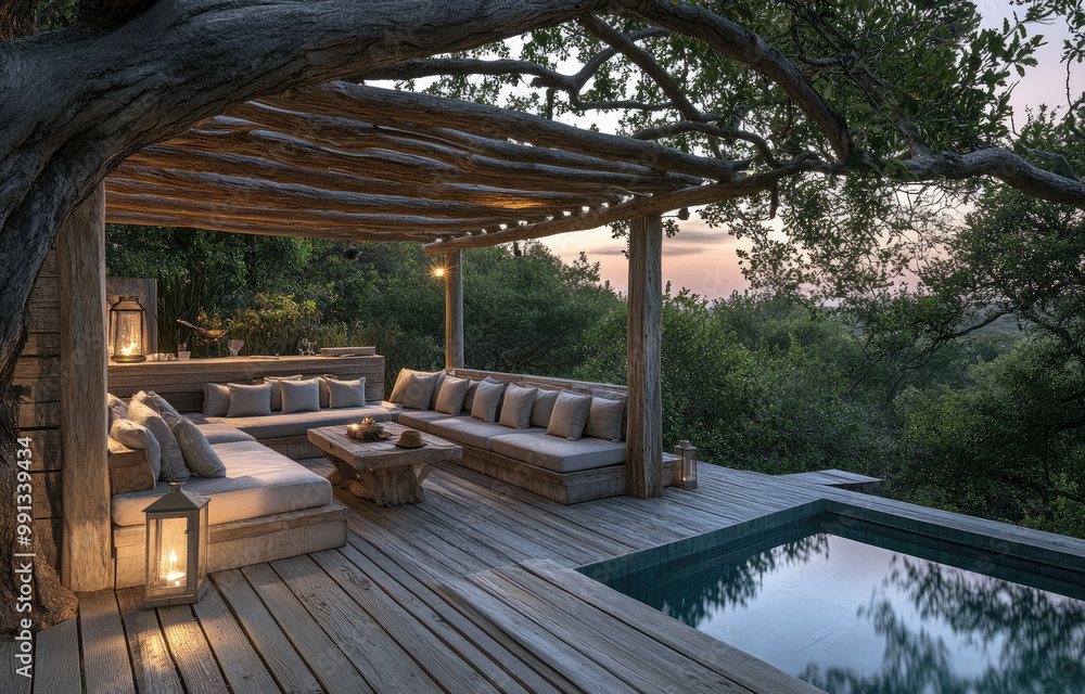 A wooden terrace with an outdoor seating area and a pool, surrounded by trees at sunset A wooden terrace with an outdoor seating area and a pool, surrounded by trees at sunset