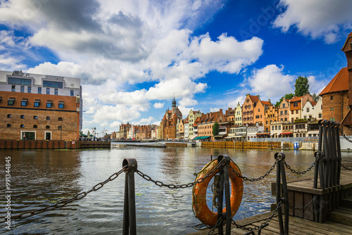 Beautiful city of Gdansk in the margins of the Motlawa river with the touristic boats and coloured buildings