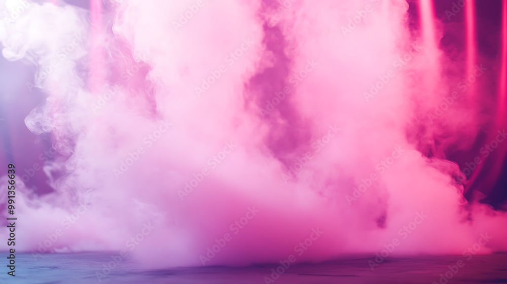 Naklejka premium Pink and orange smoke swirling together on a stage, giving a warm, sunset-like effect