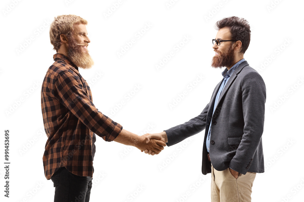 Profile shot of two bearded men shaking hands Profile shot of two bearded men shaking hands