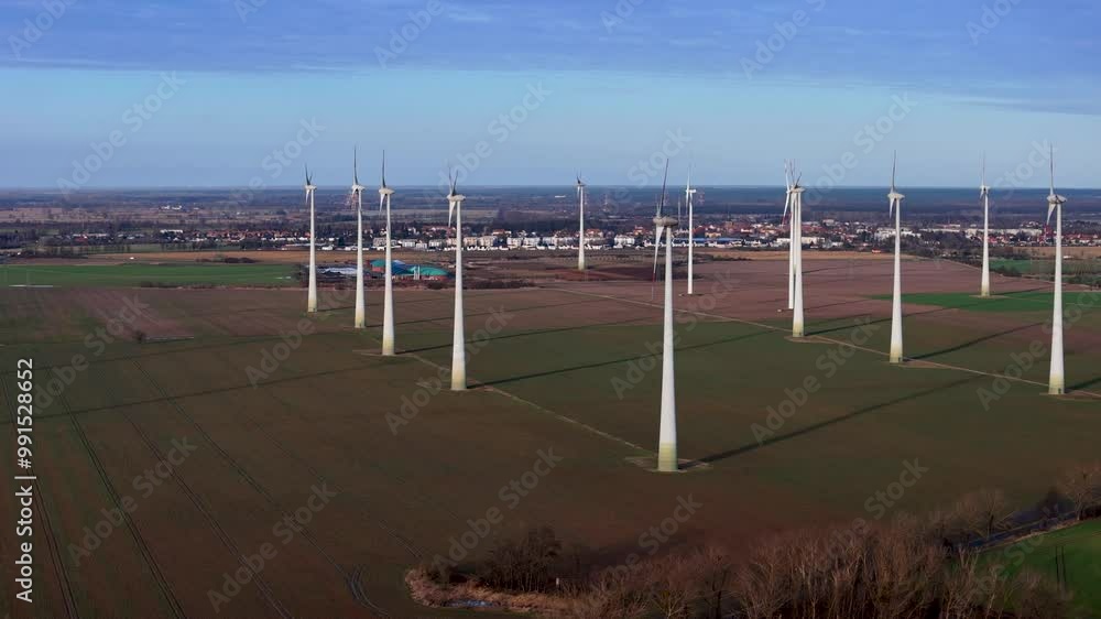 Electricity wind turbine power generator in Germany. Aerial shot with drone.	
