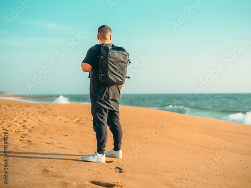 man walking on the beach