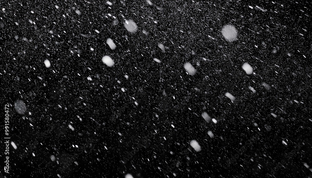 Countless cosmic elements, snapshot of falling snow and rain, extreme winter storm in progress. Still shot on black background with separate overlay Countless cosmic elements, snapshot of falling snow and rain, extreme winter storm in progress. Still shot on black background with separate overlay