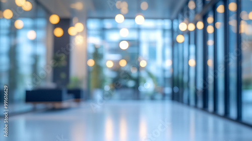 Empty Modern Office Lobby with Glass Walls and Floor, Blurry and unfocused backdrop in an empty office with glass windows for a copy space image.