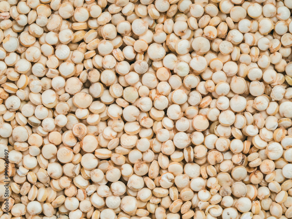 Grain of quinoa. Uncooked raw quinoa as background. Healthy vegan food concept and pattern Grain of quinoa. Uncooked raw quinoa as background. Healthy vegan food concept and pattern