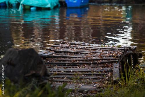 The Golden Ring of Russia, the city of Pereslavl-Zalessky. Fishing boats on the Trubezh River at dawn. photo