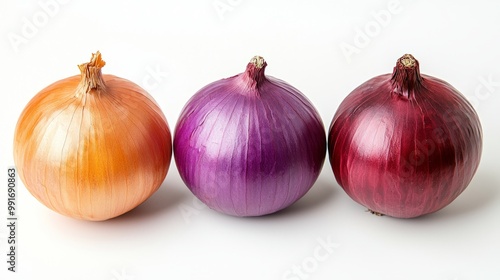 Three onions in a row showcasing different colors and textures