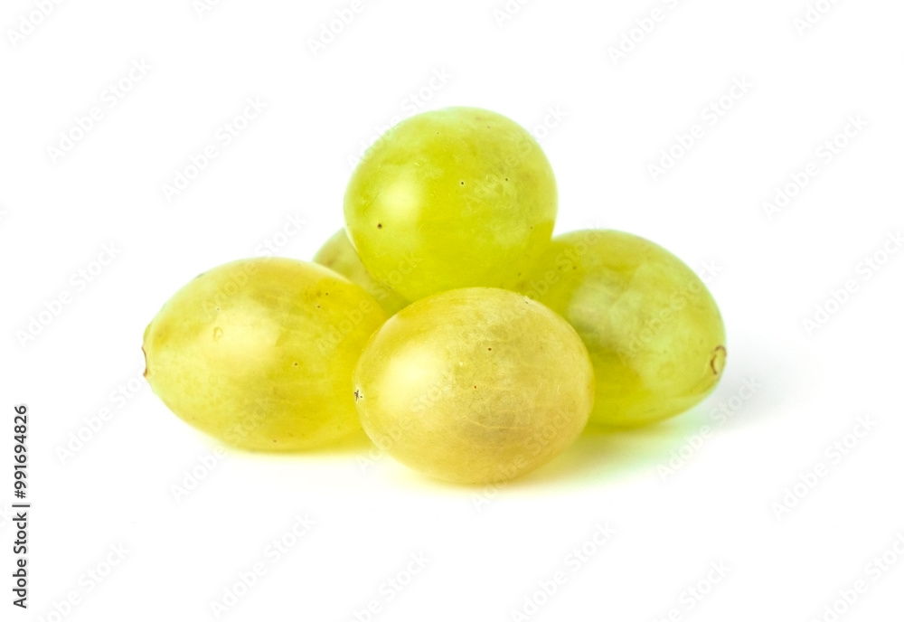 A bunch of grapes are sitting on a white background A bunch of grapes are sitting on a white background