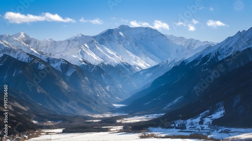Wallpaper Mural Majestic Snow-Capped Mountains Under Bright Blue Winter Sky with Snowy Valley Torontodigital.ca