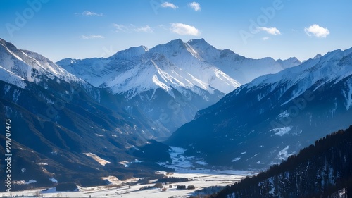 Wallpaper Mural Majestic Snow-Capped Mountains Under Bright Blue Winter Sky with Snowy Valley Torontodigital.ca