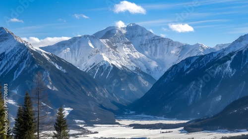 Wallpaper Mural Majestic Snow-Capped Mountains Under Bright Blue Winter Sky with Snowy Valley Torontodigital.ca
