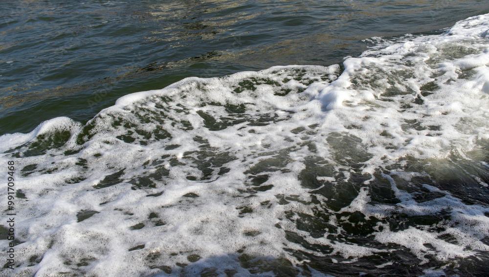 foam created by the ferry in the sea. foam created by the ferry in the sea.