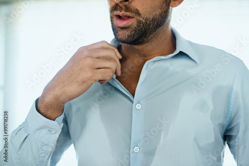 Man, shirt and sweating in house with heat for medical problem, bacteria and hyperhidrosis in bedroom. Professional, person or nervous for smelly underarm, odor and hygiene issue with anxiety in home