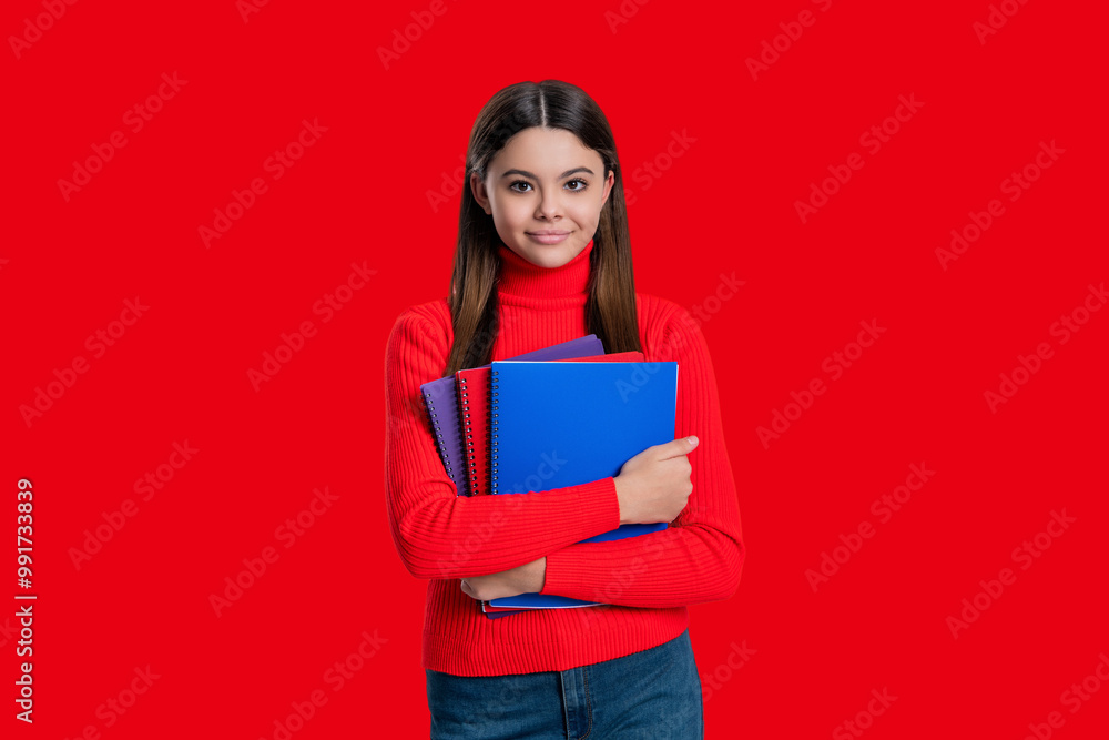 Teen girl student isolated on red. September 1. High school education. Knowledge through study. Teen girl studying with workbook. Back to school. Knowledge and education. Specialized knowledge Teen girl student isolated on red. September 1. High school education. Knowledge through study. Teen girl studying with workbook. Back to school. Knowledge and education. Specialized knowledge