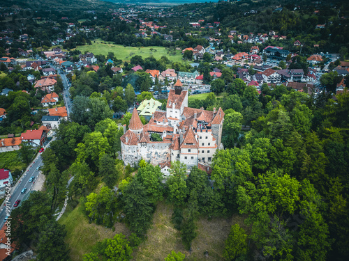 Drone view of Bran Castle, showcasing the medieval fortress and its stunning landscape from above.