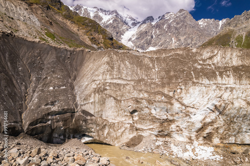 Glacier with mountain backdrop photo