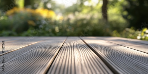 image depicts a close-up of a wooden terrace or deck, focusing on the grain and texture of the wood planks