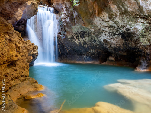 Ebron river narrows waterfall near Castielfabib village, Teruel photo