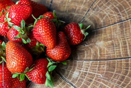 strawberries on a wooden background