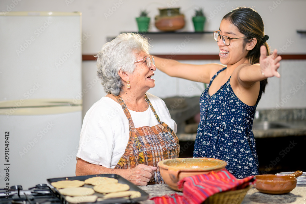Granddaughter excitedly runs towards her grandmother to give her a big hug. Granddaughter excitedly runs towards her grandmother to give her a big hug.